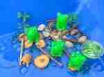 4 Green Speckeled Frogs Sensory bin