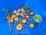 4 Green Speckeled Frogs Sensory bin