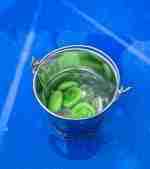 4 Green Speckeled Frogs Sensory bin