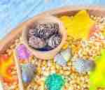 Leaves and Popcorn Fall Sensory Bin