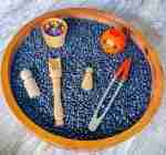 Black bean halloween sensory bin