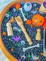 Black bean halloween sensory bin