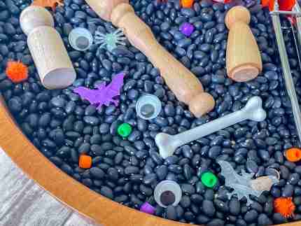 Black bean halloween sensory bin