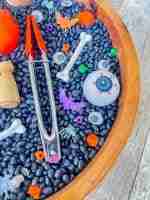 Black bean halloween sensory bin