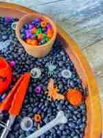 Black bean halloween sensory bin