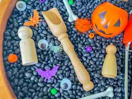 Black bean halloween sensory bin
