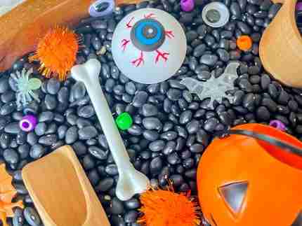 Black bean halloween sensory bin