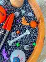 Black bean halloween sensory bin