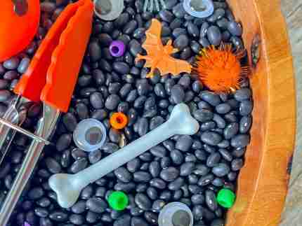 Black bean halloween sensory bin