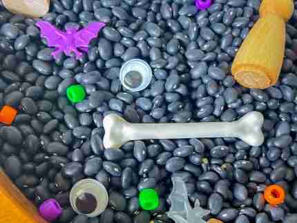 Black bean halloween sensory bin