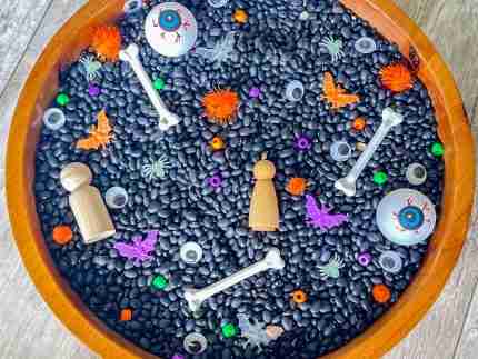 Black bean halloween sensory bin