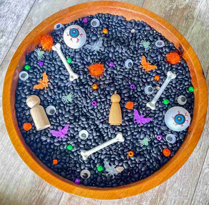 Black bean halloween sensory bin