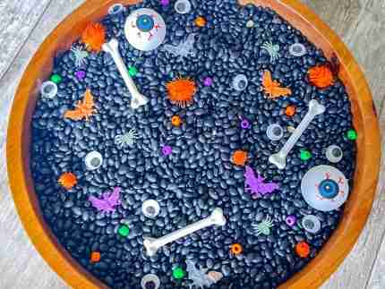 Black bean halloween sensory bin