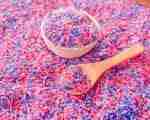pink and purple sensory rice