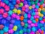 Watercolor dyed wooden acorns for sensory play