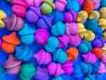 Watercolor dyed wooden acorns for sensory play