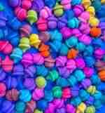 Watercolor dyed wooden acorns for sensory play