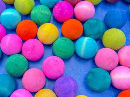 Watercolor dyed wooden balls for sensory play