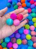 Watercolor dyed wooden balls for sensory play