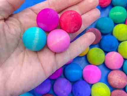 Watercolor dyed wooden balls for sensory play