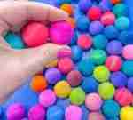 Watercolor dyed wooden balls for sensory play