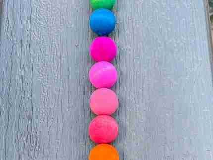 Watercolor dyed wooden balls for sensory play