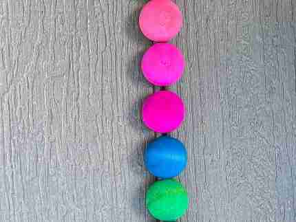 Watercolor dyed wooden balls for sensory play
