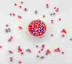 Shimmery valentines day pasta sensory filler