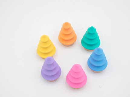 Pastel wooden trees in pink, yellow, peach, mint, blue, and lavender with natural wood bases