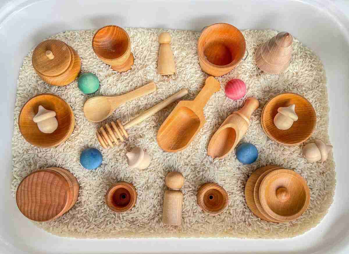 A tray of wooden utensils
