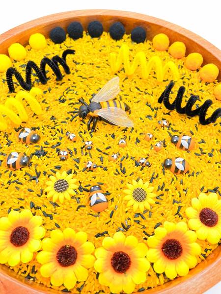 A bee on a yellow rice
