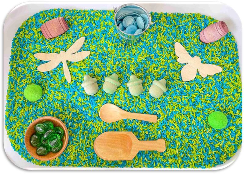 A colorful mat with wooden spoons and objects