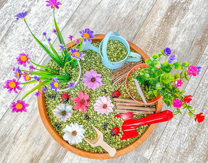 A potted plants and flowers in a bowl

AI-generated content may be incorrect.