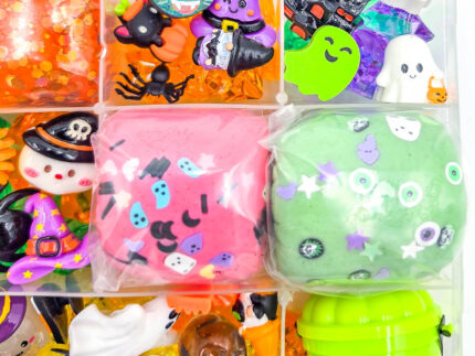 Deluxe Halloween Playdough Kit with four playdough balls, ghost, spider, and pumpkin charms in a clear case