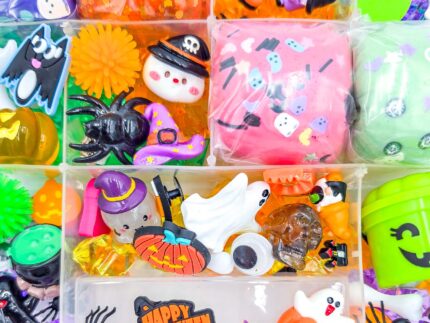 Deluxe Halloween Playdough Kit with four playdough balls, ghost, spider, and pumpkin charms in a clear case