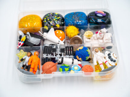 Deluxe Outer Space Play-Doh Kit with colorful dough, astronauts, rockets, planets, spacecraft, and space-themed sensory pieces