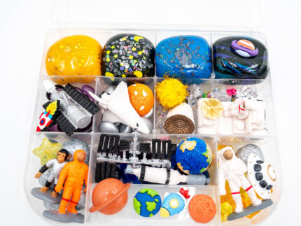Deluxe Outer Space Play-Doh Kit with colorful dough, astronauts, rockets, planets, spacecraft, and space-themed sensory pieces