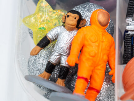 Deluxe Outer Space Play-Doh Kit with colorful dough, astronauts, rockets, planets, spacecraft, and space-themed sensory pieces