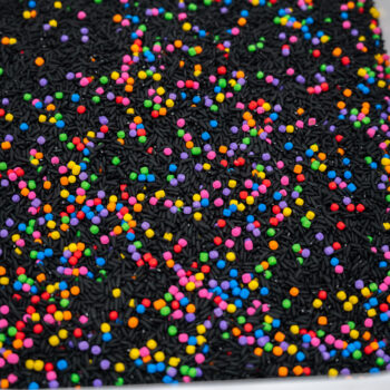 Midnight Rainbow sensory filler with black rice and colorful rainbow couscous