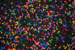 Midnight Rainbow sensory filler with black rice and colorful rainbow couscous