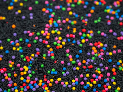 Midnight Rainbow sensory filler with black rice and colorful rainbow couscous