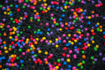 Midnight Rainbow sensory filler with black rice and colorful rainbow couscous