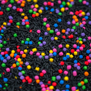 Midnight Rainbow sensory filler with black rice and colorful rainbow couscous