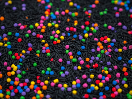 Midnight Rainbow sensory filler with black rice and colorful rainbow couscous