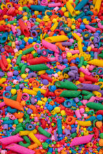 Rainbow Explosion Sensory Filler Mix with colorful rice pasta chickpeas and pearls