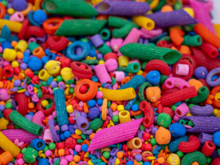 Rainbow Explosion Sensory Filler Mix with colorful rice pasta chickpeas and pearls