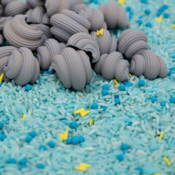 Stormy Skies Sensory Filler Mix with blue rice gray clouds and yellow lightning