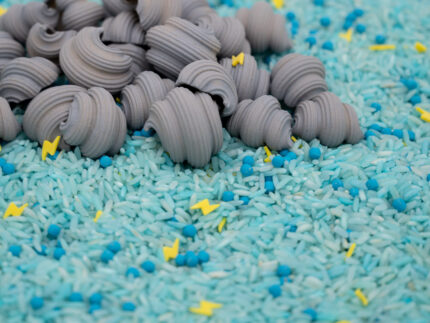 Stormy Skies Sensory Filler Mix with blue rice gray clouds and yellow lightning
