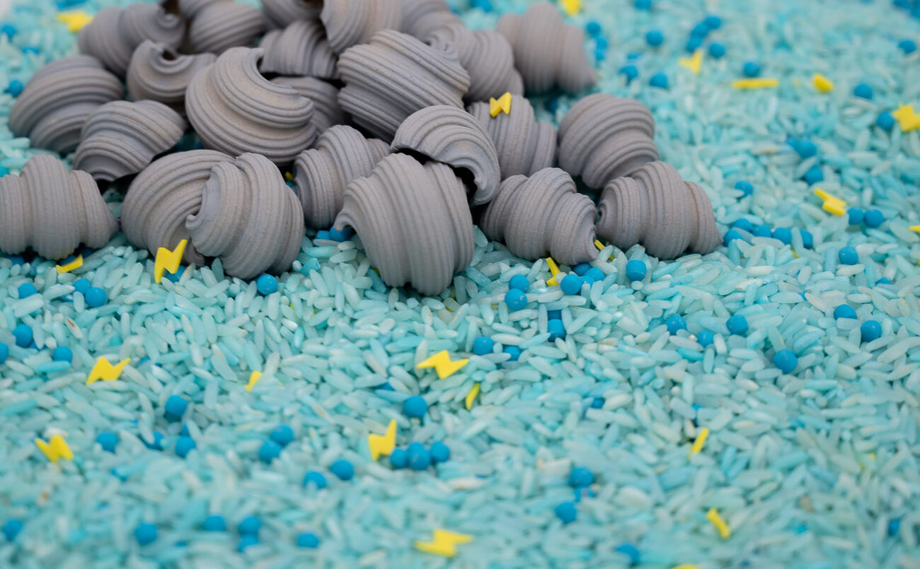 Stormy Skies Mix-1 Stormy Skies Sensory Filler Mix with blue rice gray clouds and yellow lightning