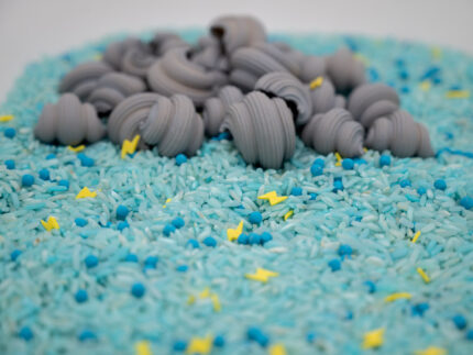 Stormy Skies Sensory Filler Mix with blue rice gray clouds and yellow lightning